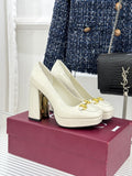 Gucci white leather loafer heels with gold horsebit detail and stacked block heel