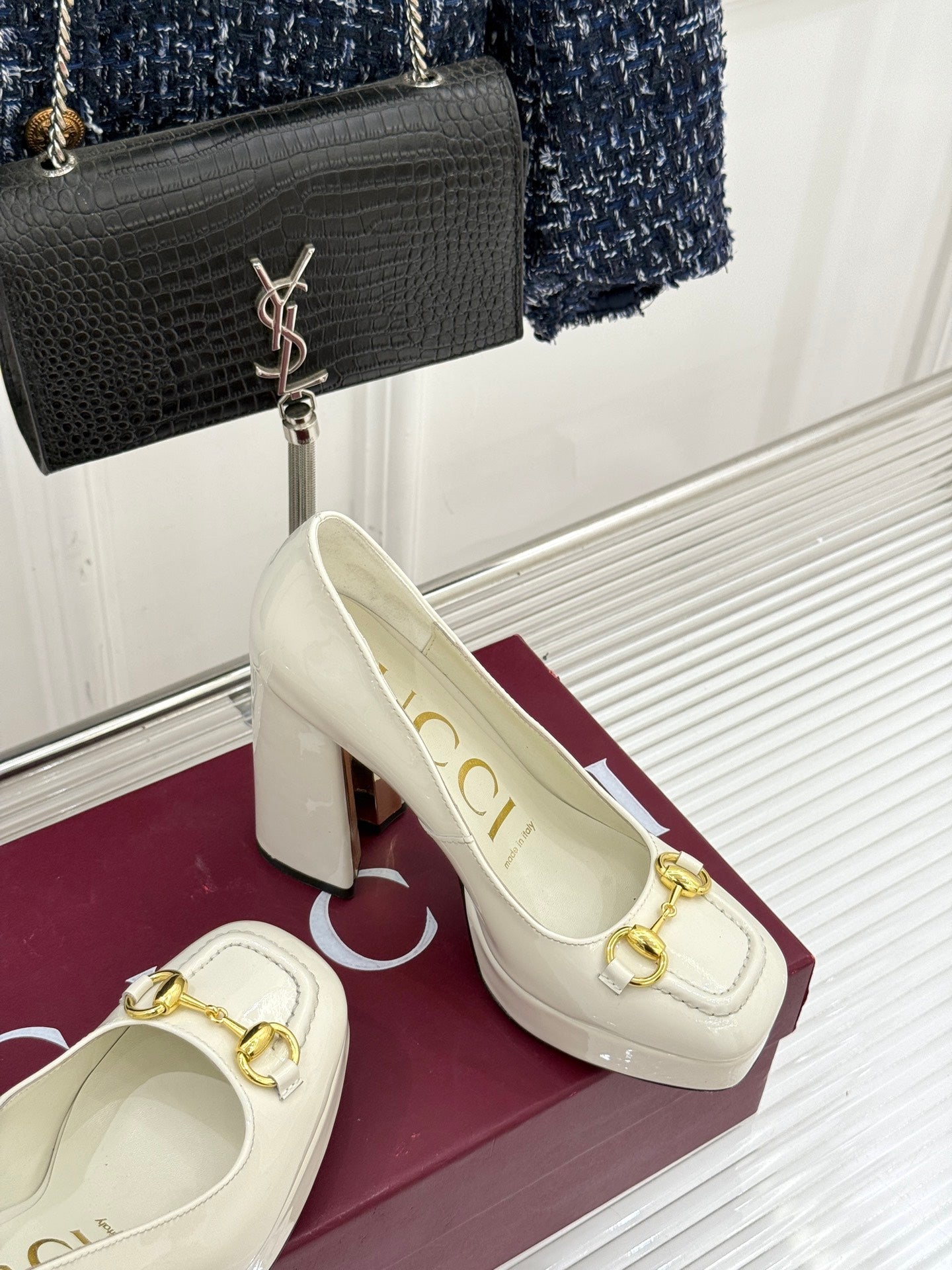 Gucci white leather loafer heels with gold horsebit detail and block heel