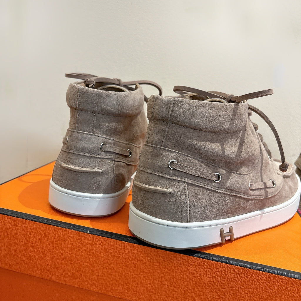 Hermes unisex gray suede high-top sneakers, heel view with lace-up and white sole.