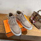 Hermes unisex gray suede lace-up high-top sneakers with white trim sole.