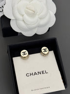 Gold-tone Chanel CC stud earrings, round bezel with black logo detail