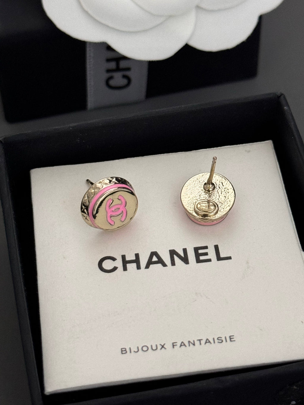 Chanel CC stud earrings with pink enamel and gold-tone accents, round bezel