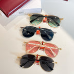 Gucci glasses set: four pairs with gold-tone frames and tinted lenses in red and dark colors