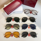 Assorted Gucci round sunglasses with mixed frames and colored lenses.