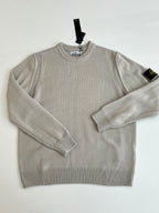 Light gray knit sweater with crew neck and ribbed hem, long sleeves