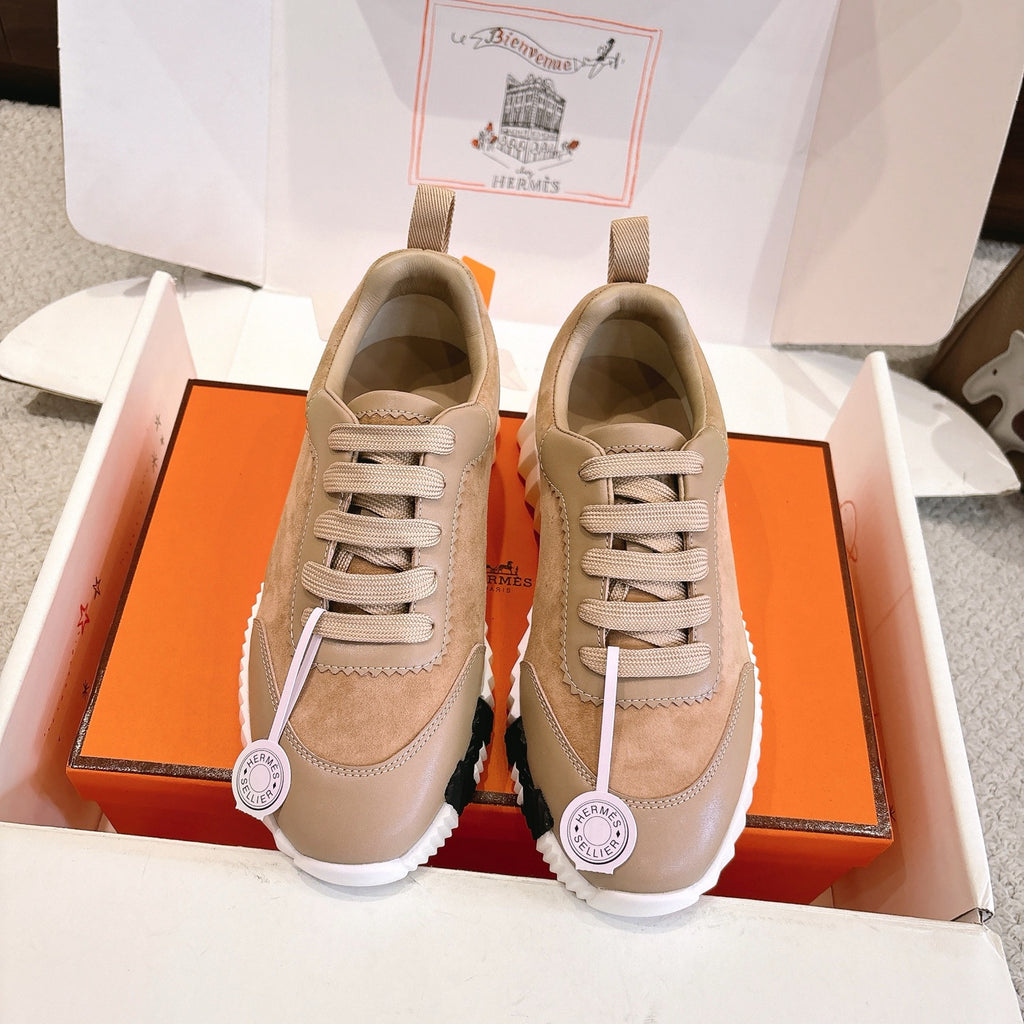 Hermes unisex sneakers in beige and tan suede/leather with lace-up front and rubber sole.