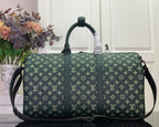 Louis Vuitton green monogram duffel bag front view with top handles and straps