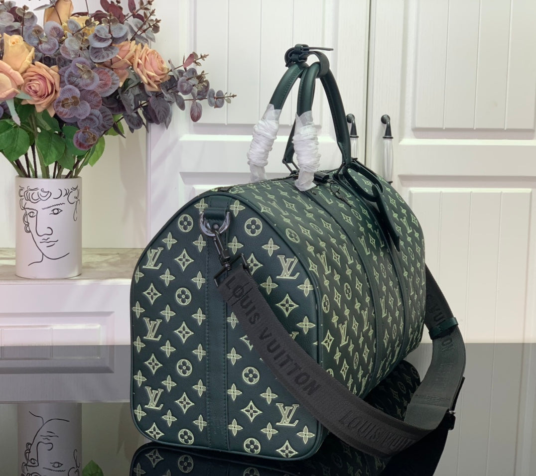 Louis Vuitton green monogram duffel bag side view with crossbody strap
