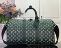 Louis Vuitton green monogram duffel bag with top handles and shoulder strap