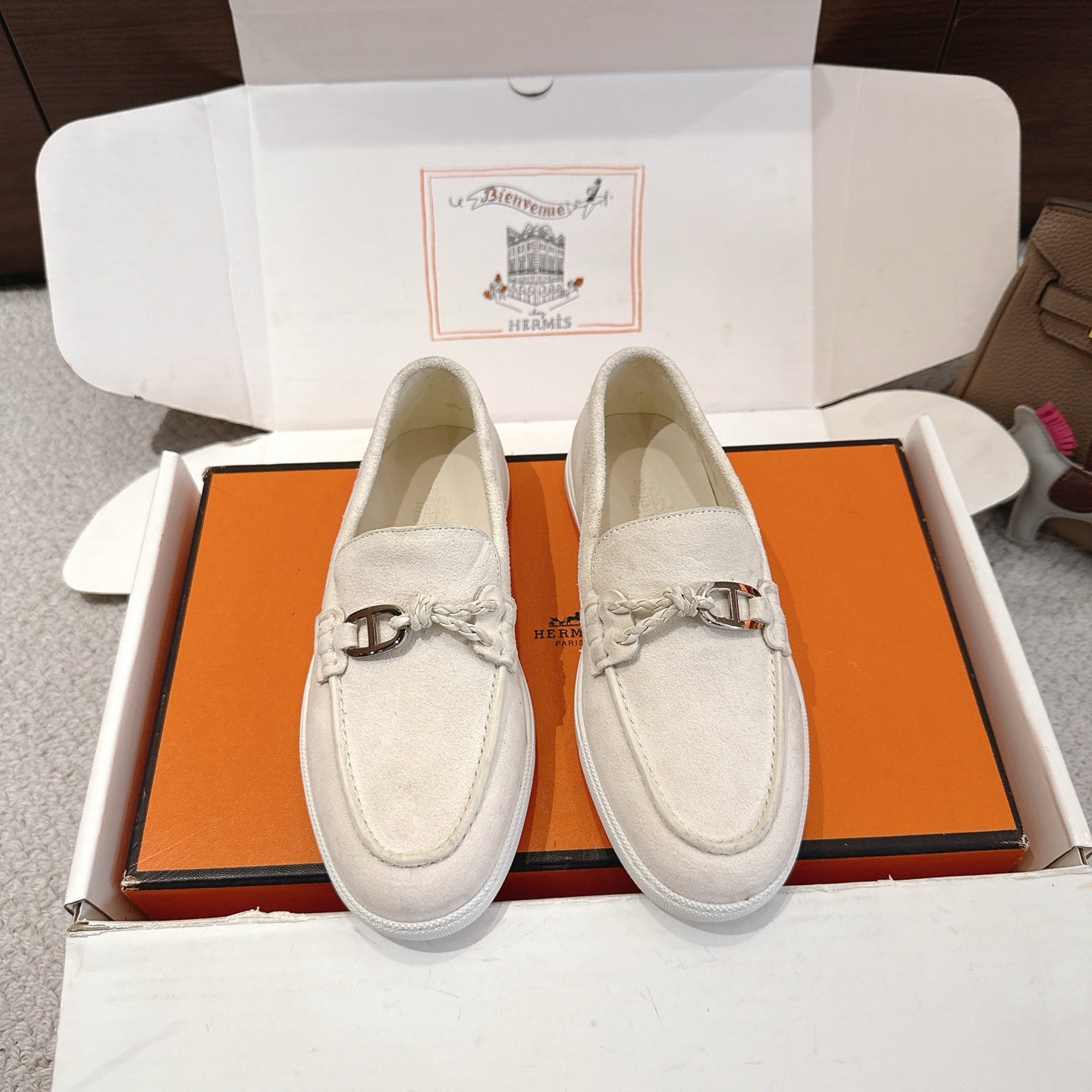 Hermes unisex white suede loafers with metal horsebit detail and slip-on design