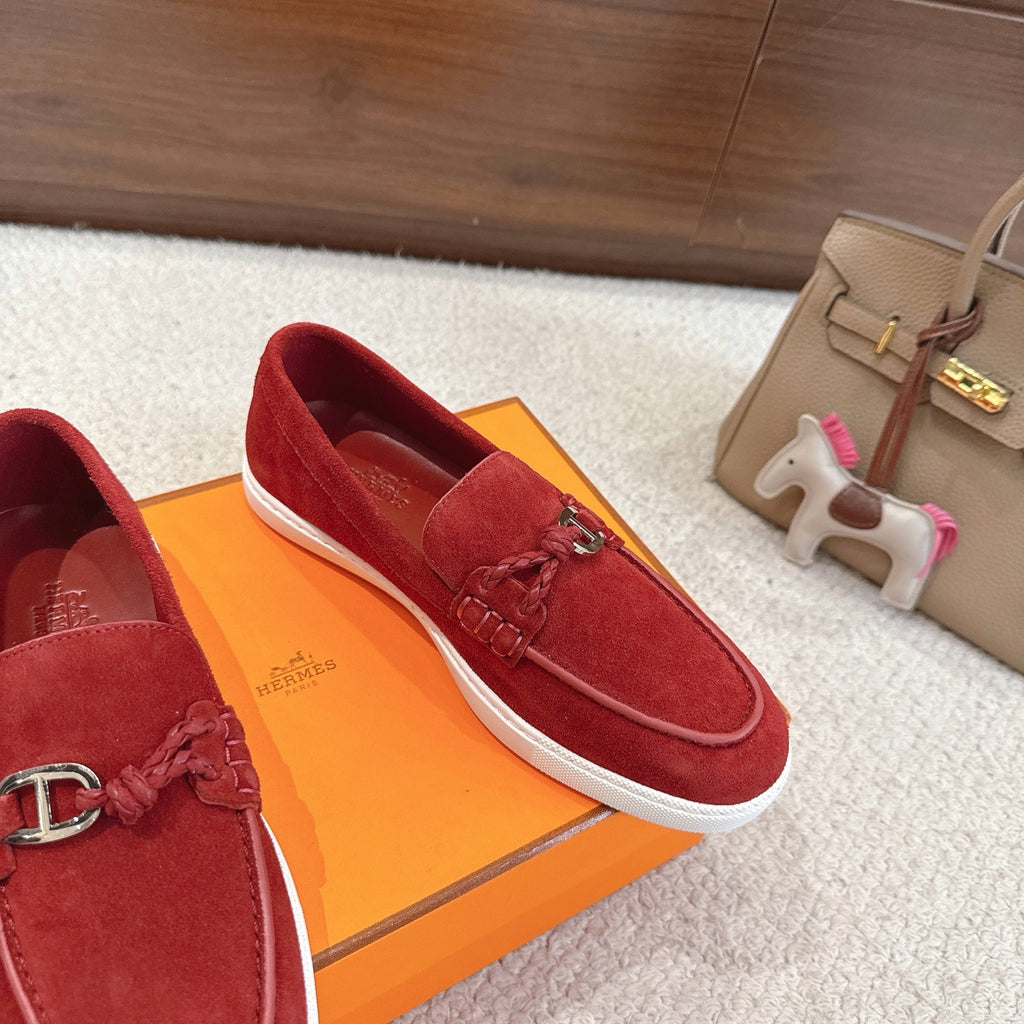 Hermes unisex red suede loafers with braided laces, metal H bit, and white edge