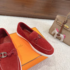 Hermes unisex red suede loafers with braided laces, metal H bit, and white edge