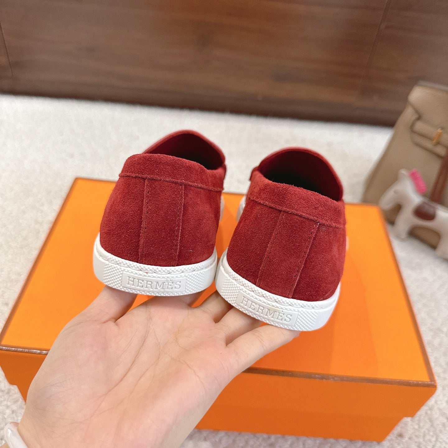Hermes unisex red suede loafers with white heel band and metal H bit