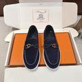 Hermes unisex navy suede loafers with gold-tone bit, braided detail, white sole