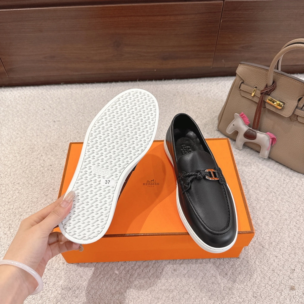 Hermes unisex loafer outsole and matching dark leather upper; textured tread, white sole edge