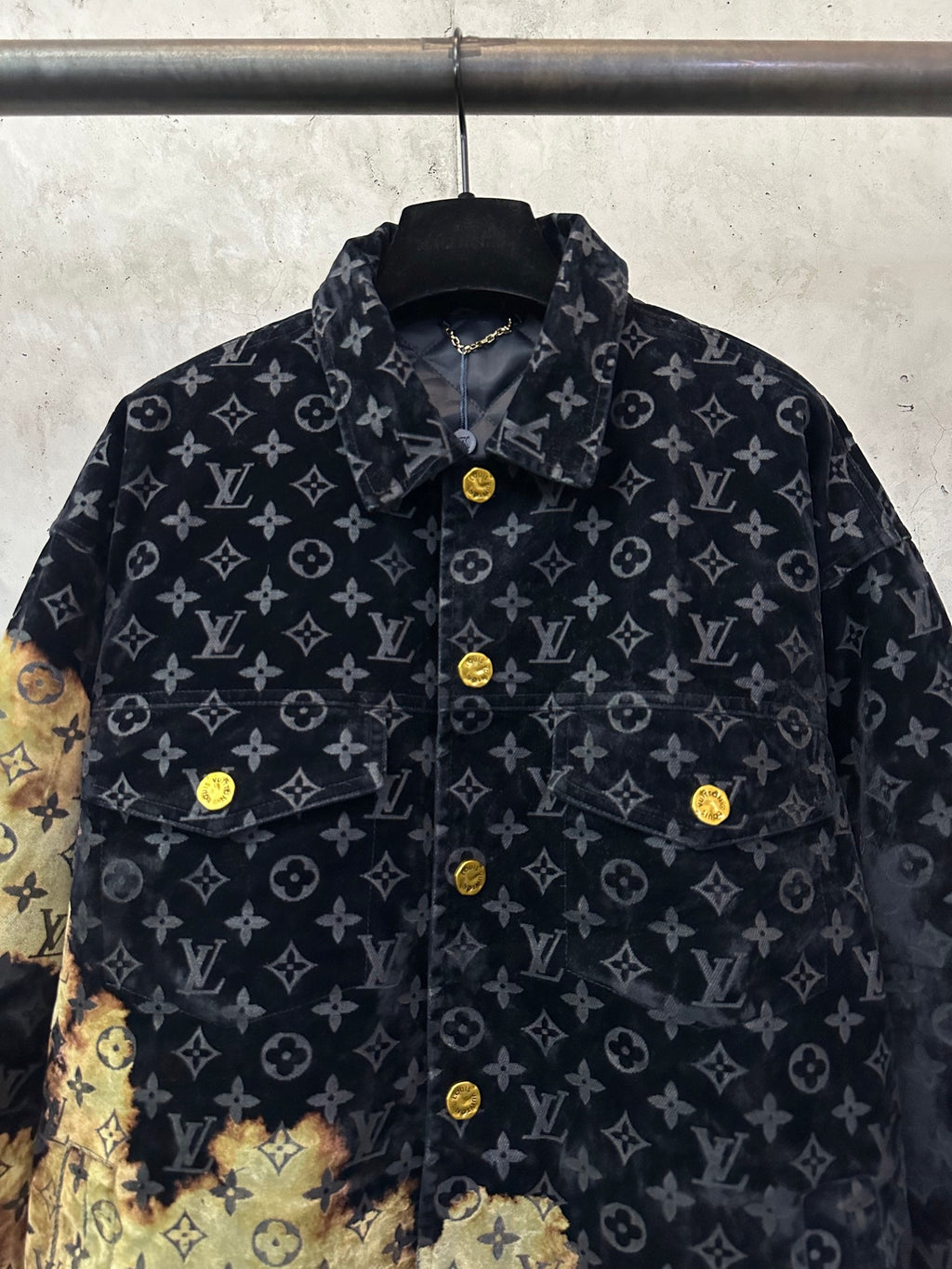 Long jacket front view with dark monogram pattern and gold-button placket