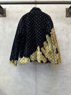 Long jacket back view with dark monogram pattern and gold textured side panels