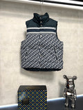 Sleeveless puffer vest with dark collar, white logo print panel, front snap buttons