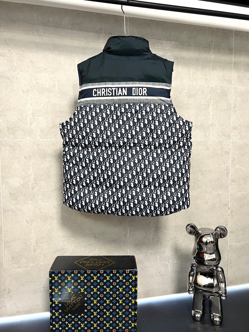 Sleeveless puffer vest back with 'CHRISTIAN DIOR' logo band and logo print panel