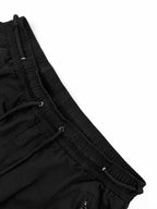 Black Dior pants waistband with gathered elastic and drawstring trim