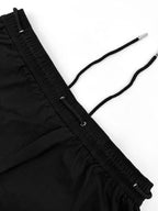 Black Dior pants with braided drawstring and ruched elastic waistband