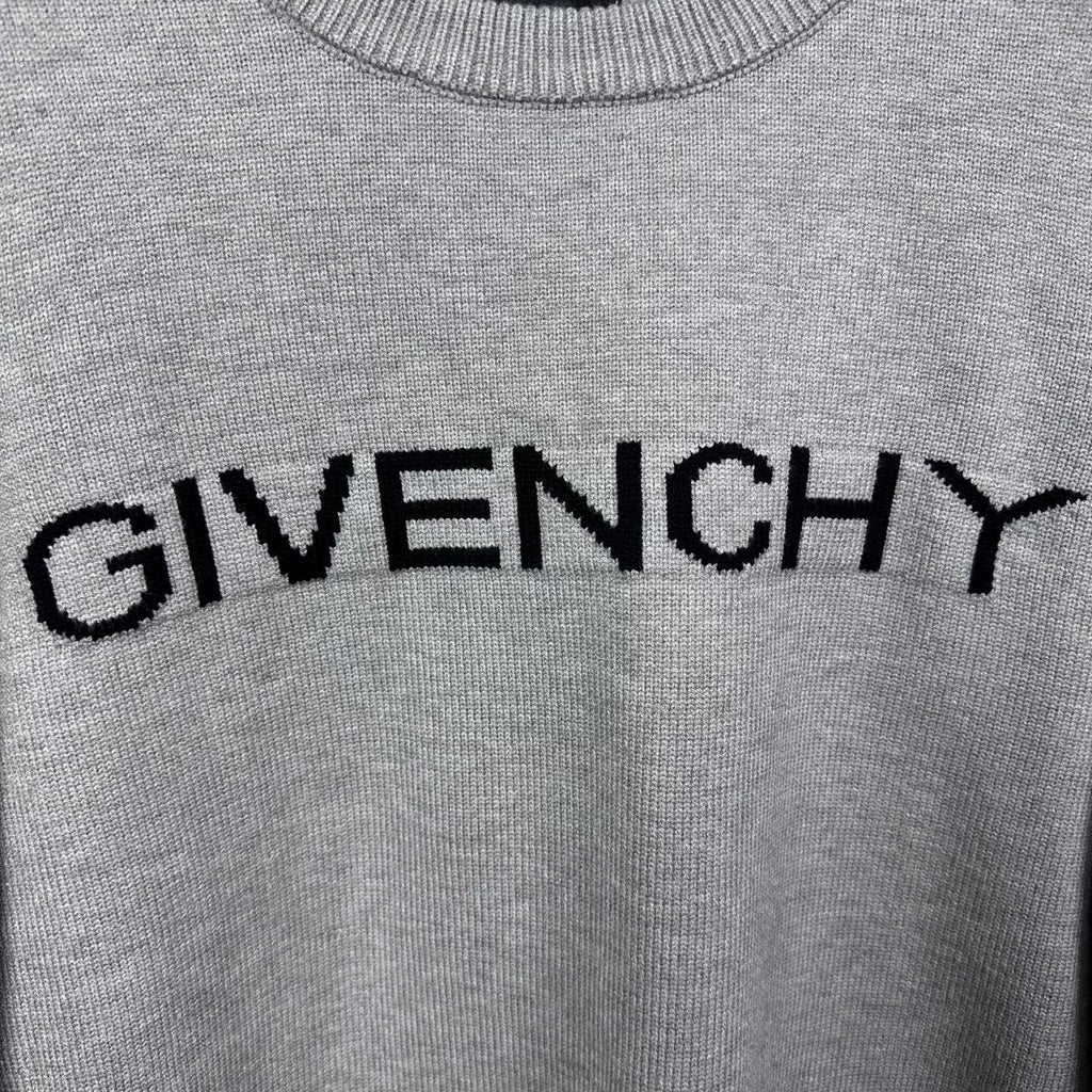 Grey knit sweater neckline with black GIVENCHY logo text across chest