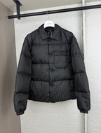 Dior long puffer jacket in dark black with stand collar and quilted paneling