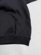 Black hoodie sweatshirt with kangaroo pocket and ribbed hem cuff