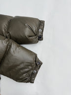Prada puffer sleeve cuff in olive with snap fasteners and elastic trim