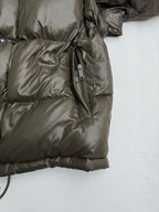 Prada puffer jacket with side zipper pocket and drawstring cord detail