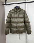 Prada long puffer jacket in olive with stand collar and button placket