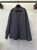 Long-sleeve striped button-up shirt, dark navy with white vertical stripes, point collar