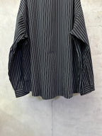 Long-sleeve striped button-up shirt, dark navy with white vertical stripes, cuff gathers