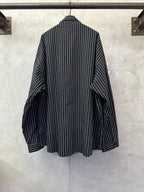 Long-sleeve striped button-up shirt, dark navy with white vertical stripes, back view