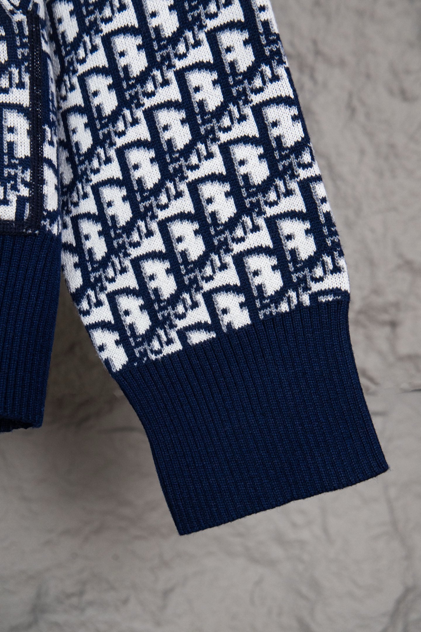 Dior long-sleeve knit sweater sleeve, navy-and-white monogram with ribbed cuff