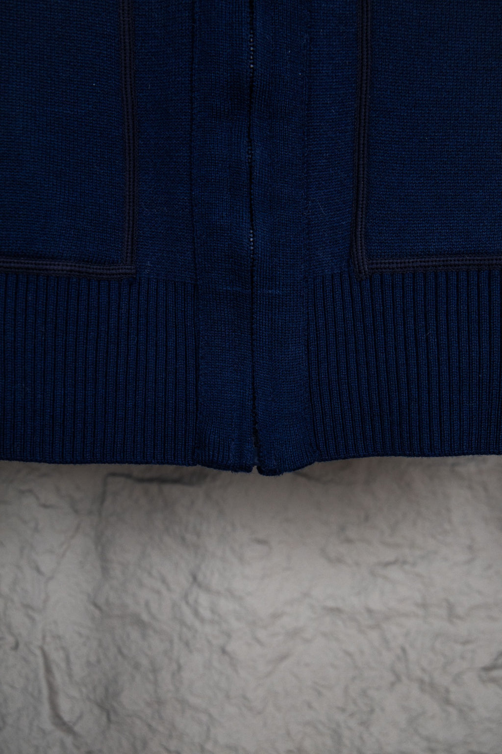 Navy Dior zip-up hoodie lower front with ribbed hem and zipper