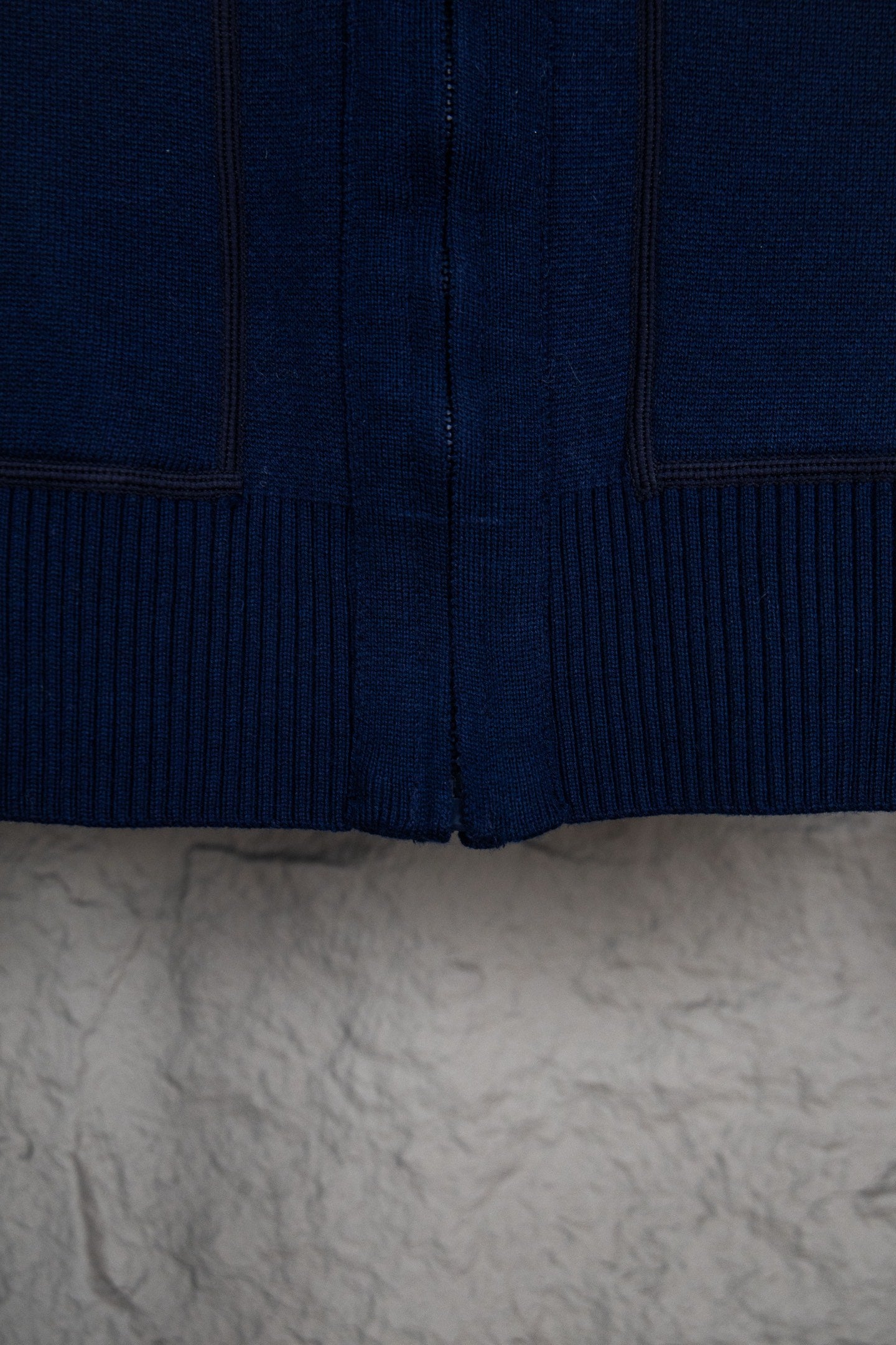 Navy Dior zip-up hoodie lower front with ribbed hem and zipper