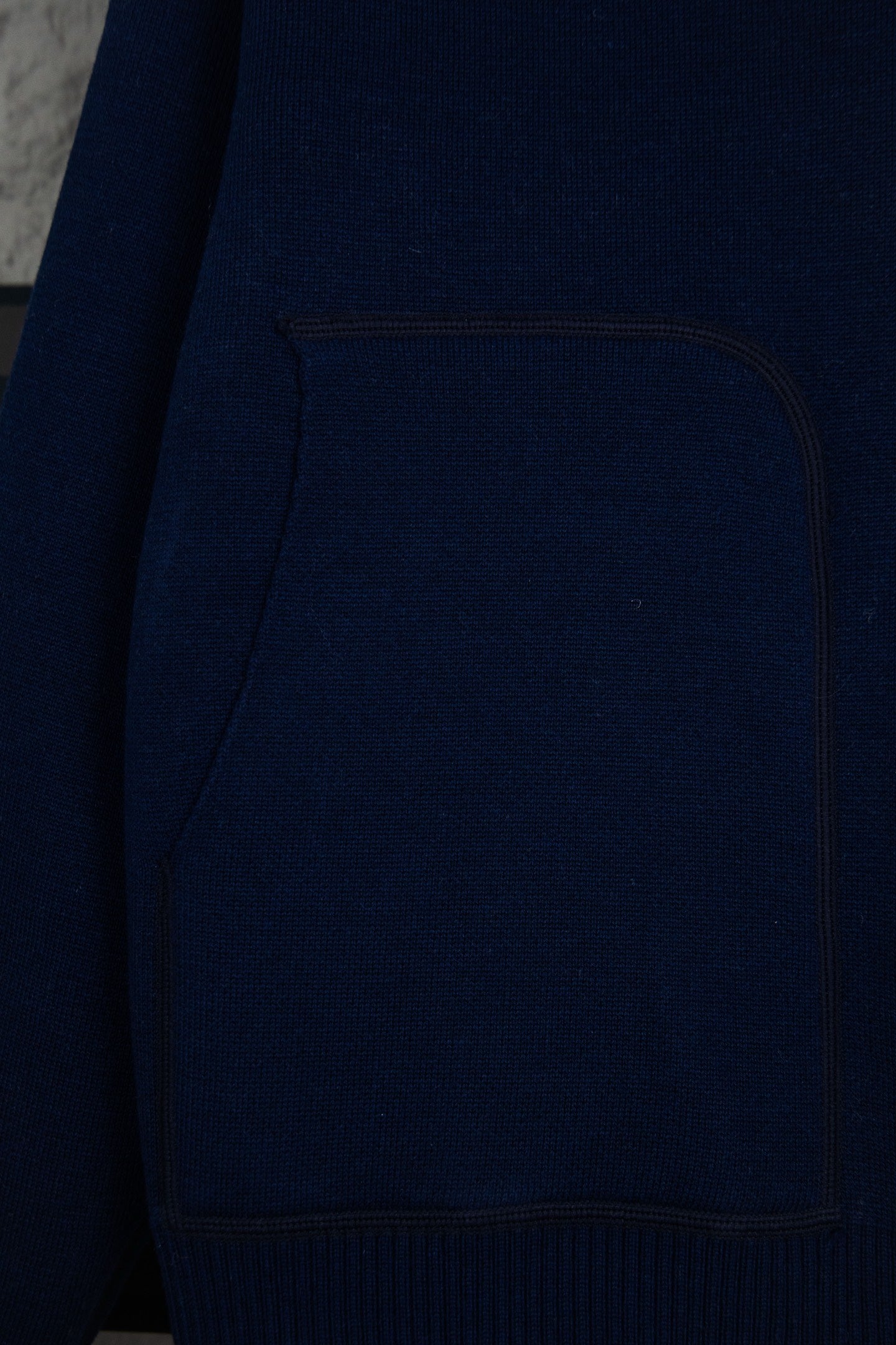 Navy Dior zip-up hoodie front pocket panel with contrast stitching