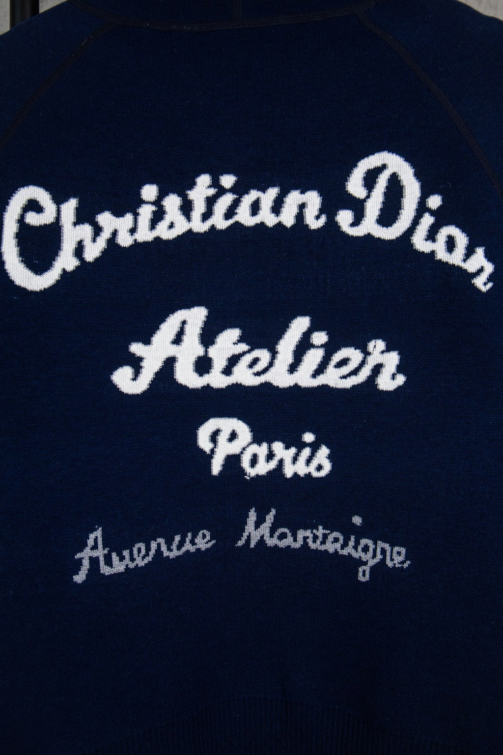 Navy Dior zip-up hoodie with Christian Dior Atelier Paris logo and text