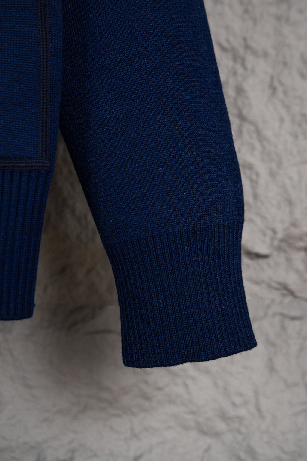Navy Dior hoodie ribbed sleeve cuff and side seam detail