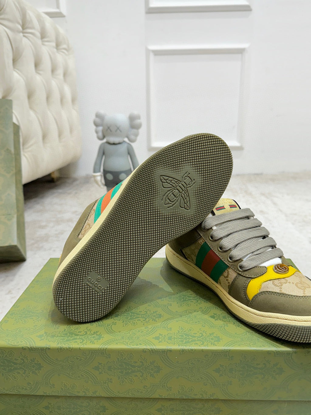 Gucci unisex sneakers with textured rubber outsole; olive upper and multicolor stripes
