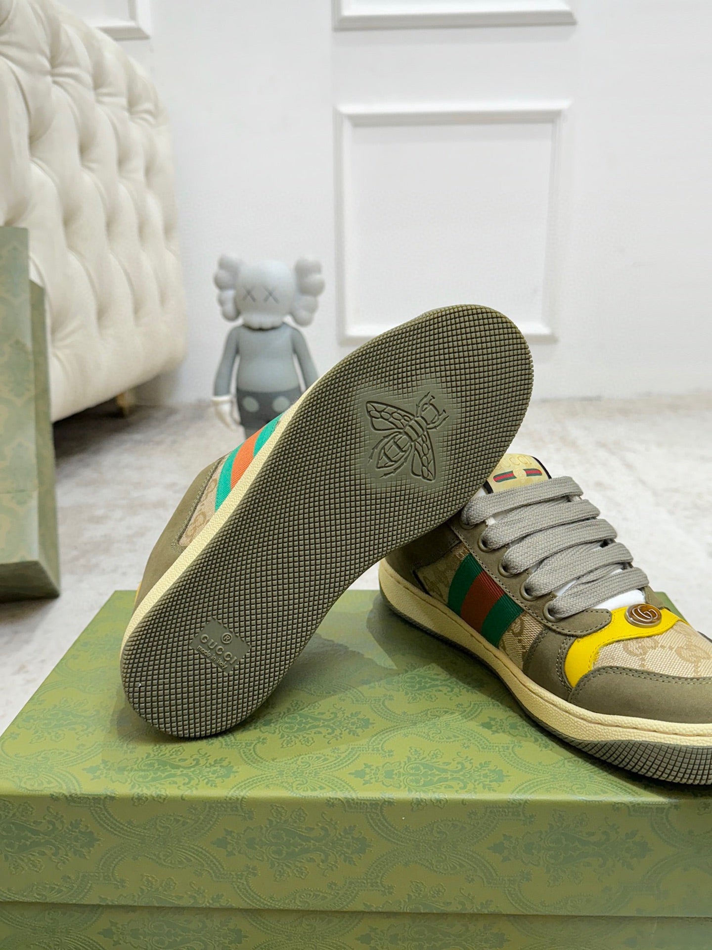 Gucci unisex sneakers with textured rubber outsole; olive upper and multicolor stripes