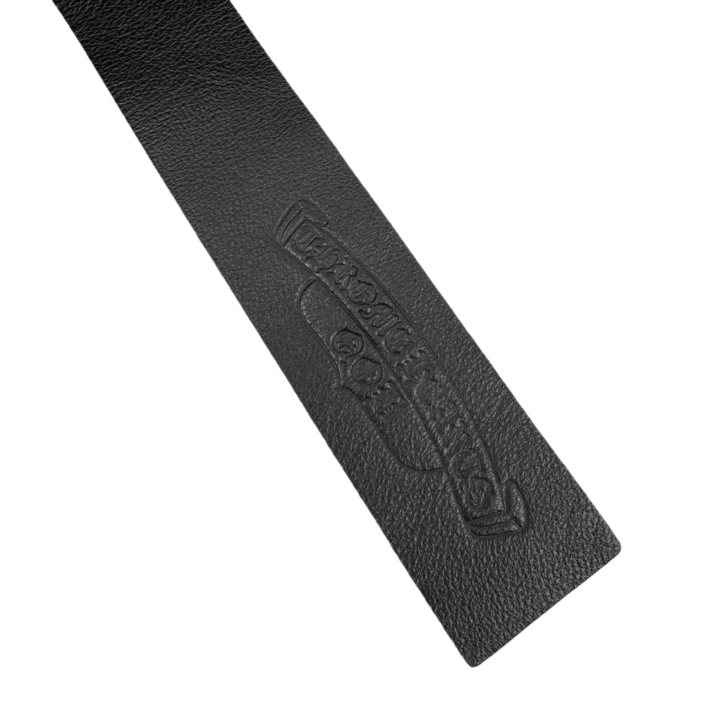 Black leather-look brand label with embossed logo on hoodie