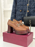 Gucci brown leather heeled loafers with silver horsebit detail and chunky block heel