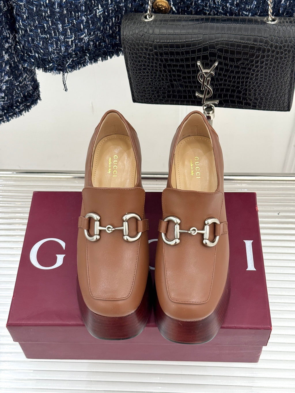 Gucci brown leather loafers with silver horsebit bit detail and rounded toe platform heel