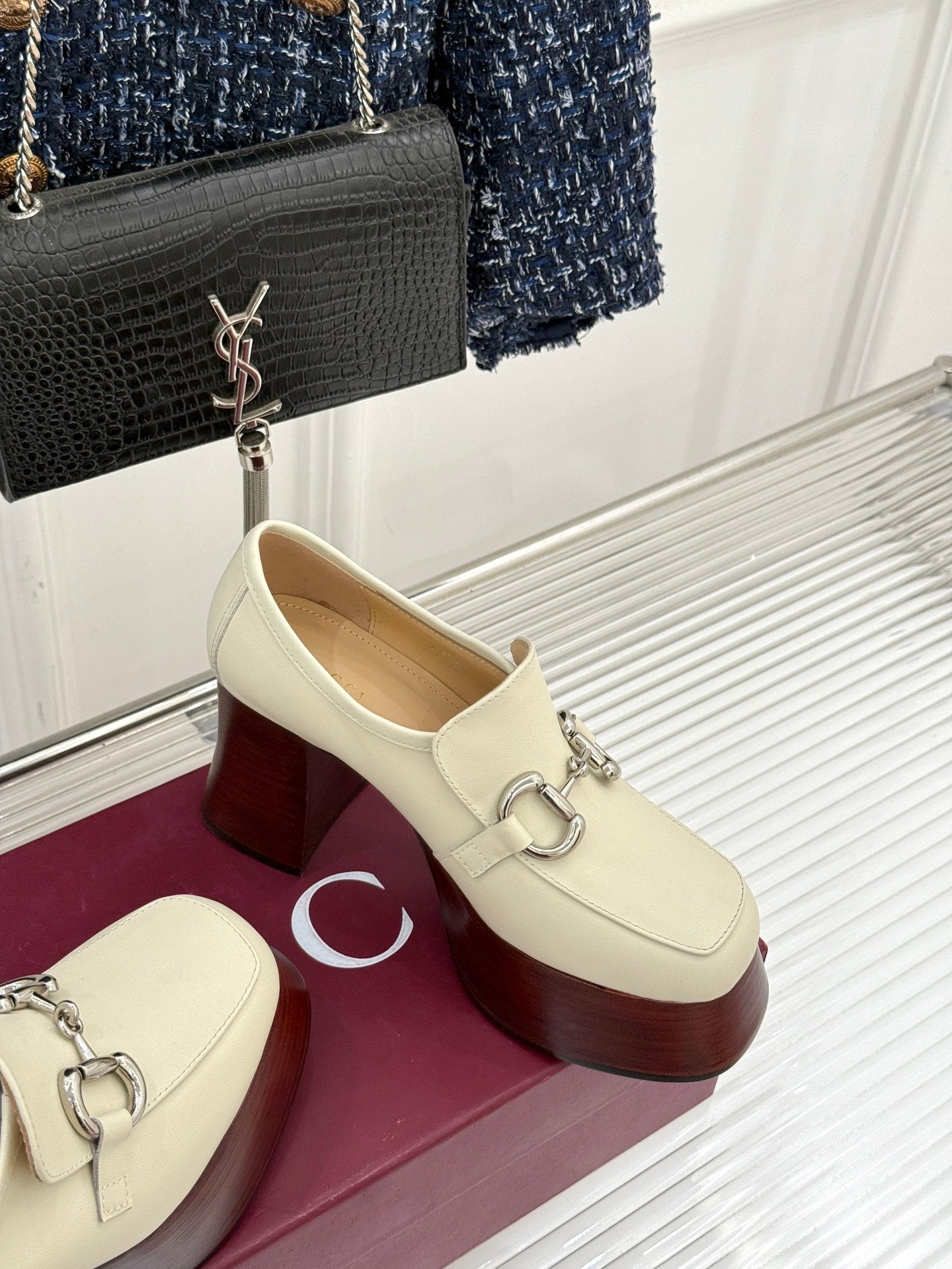 Cream Gucci loafer with metal horsebit bar and dark red chunky heel