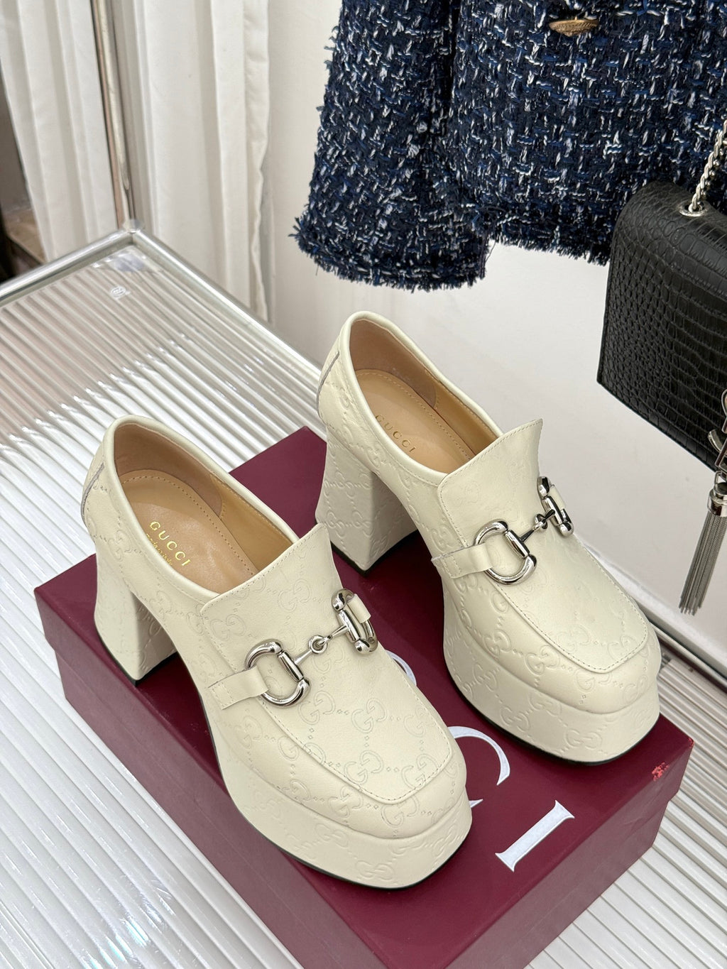 Cream leather loafers with silver horsebit and block heel, pair on display box