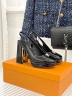 Black patent leather high-heel pumps with LV logo, glossy finish