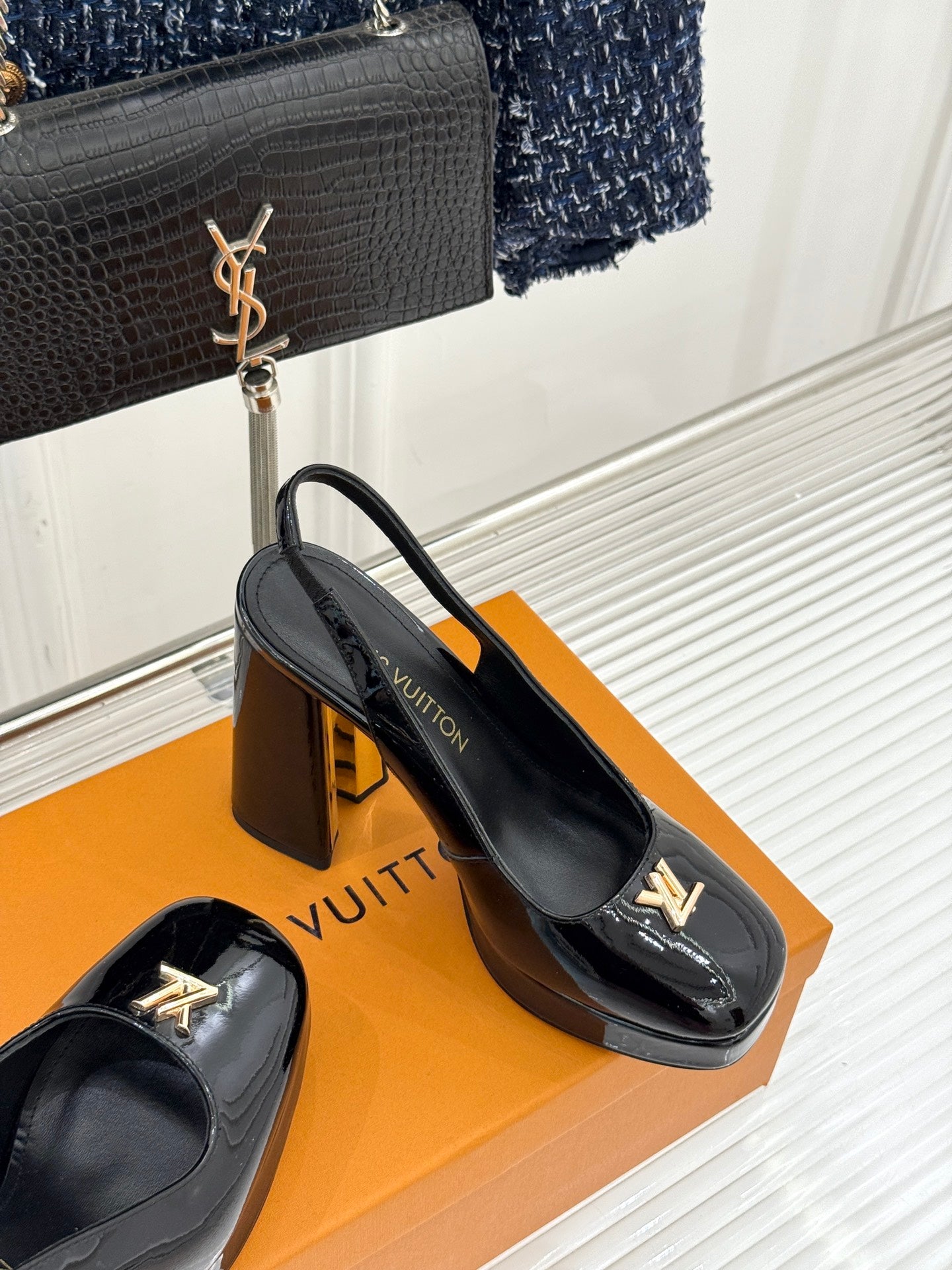 Black patent leather high-heel pumps with LV logo, block heel