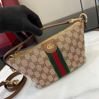 Gucci monogram crossbody bag in beige canvas with green red web stripe and zipper